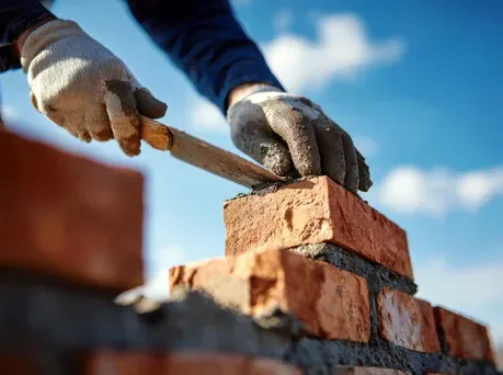 Replacing spalled bricks on a chimney in High Point